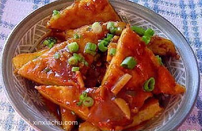 �~����u��